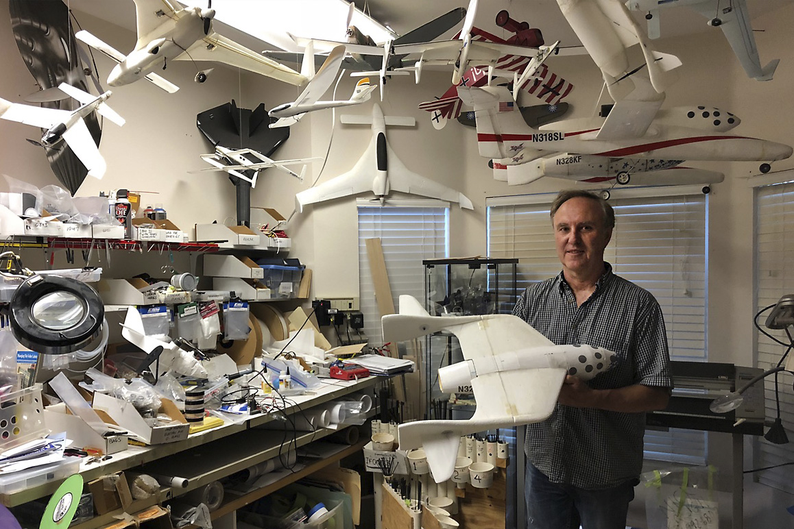 Dan Kreigh, a senior structural engineer at Scaled Composites, displays his scale model of SpaceShipOne. Photo: Daniel Housman.