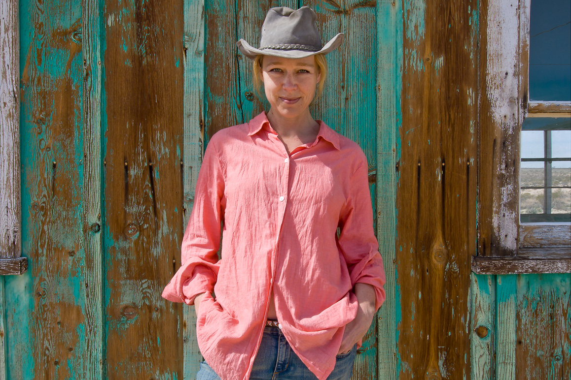 Stephanie Smith, proprietress of a highly popular vacation rental—a lovely green weathered jackrabbit in North Joshua Tree that receives 100,000 hits monthly on Airbnb. Photo: Kim Stringfellow.